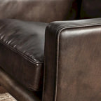 Fauteuil club classique en cuir